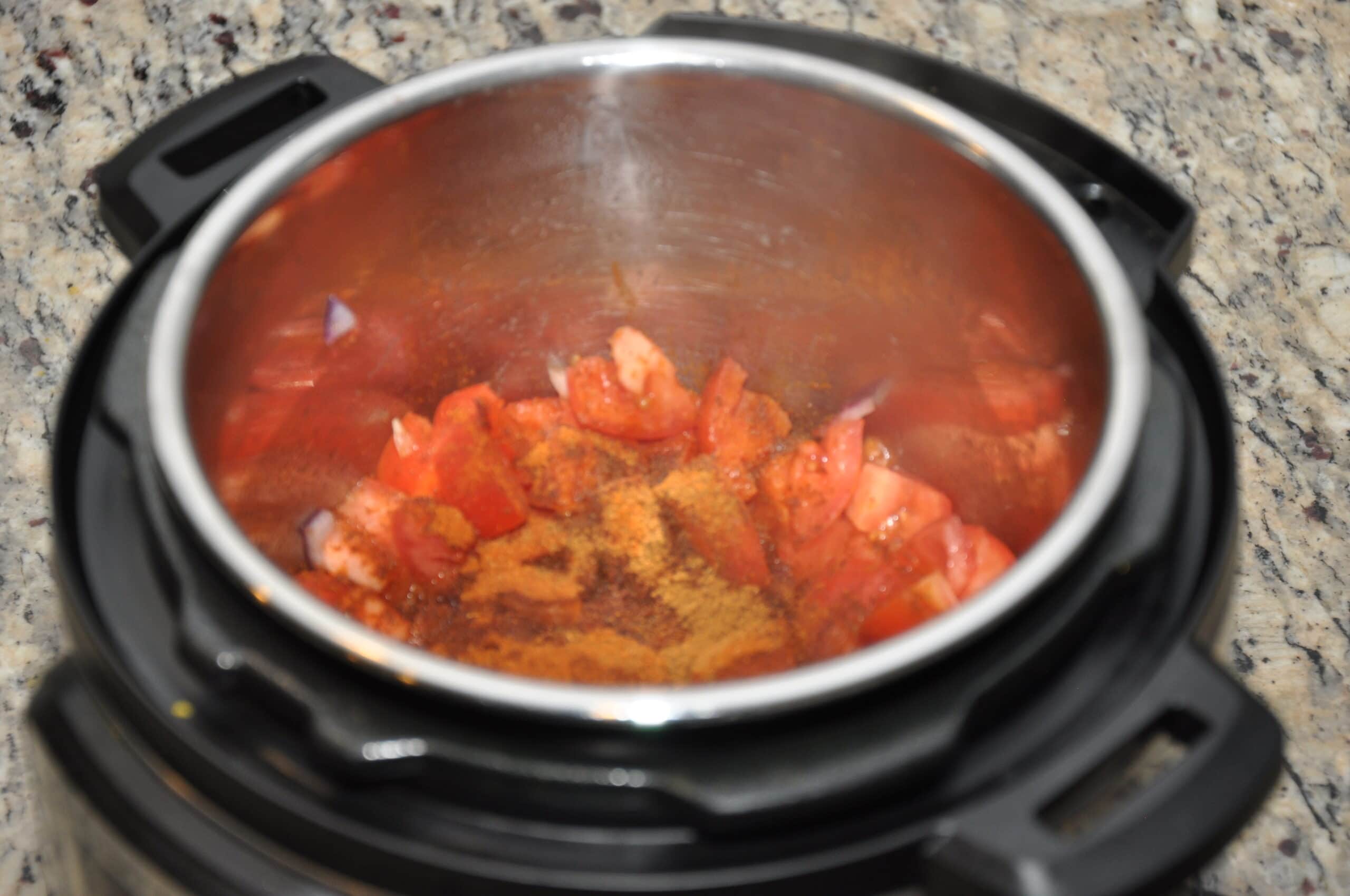 pav bhaji step 1, saute tomato, onion and spices