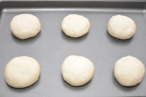 Burger bun dough balls for second rise.