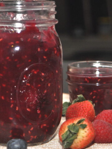 mixed berry jam in jars.