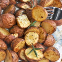 Air fryer herb potatoes in a plate.