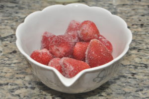 frozen strawberries in a bowl.