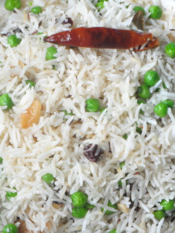 peas pulao in a bowl.