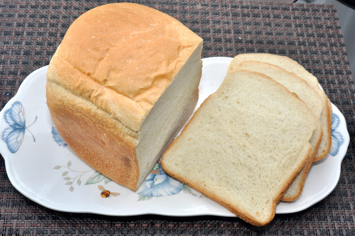 White bread loaf and slices.