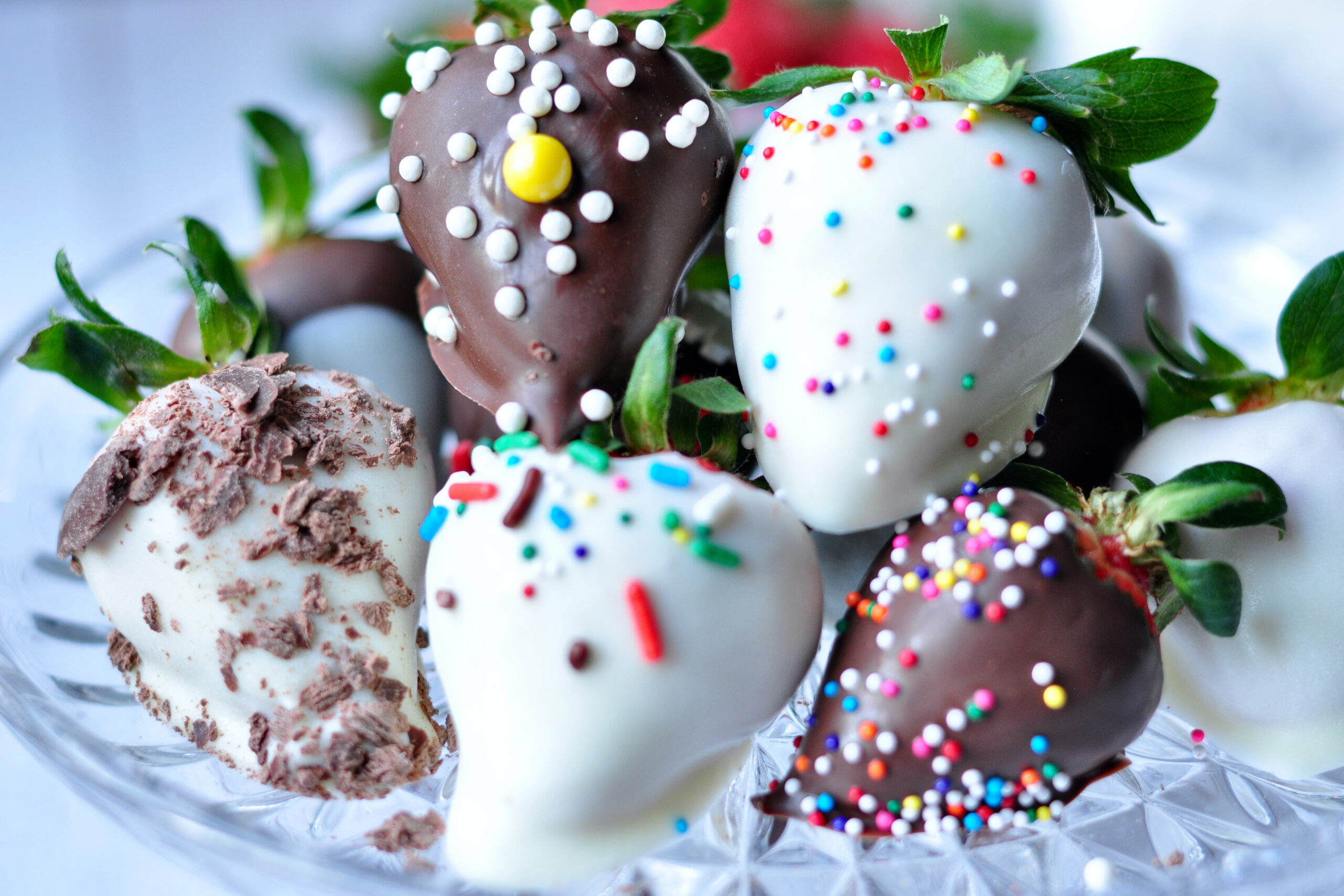 chocolate covered strawberries with sprinkles.