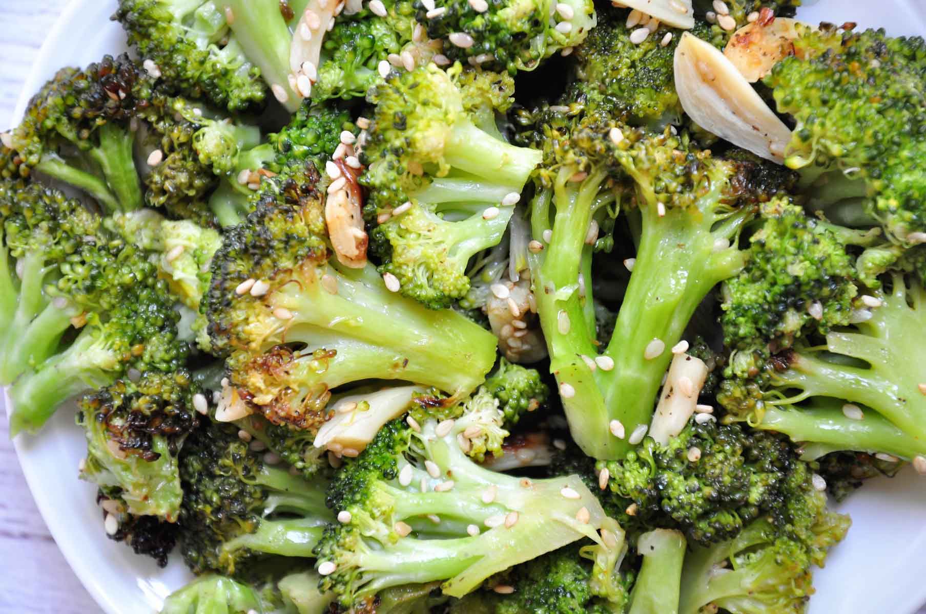 Air fried broccoli garnished with sesame seeds.
