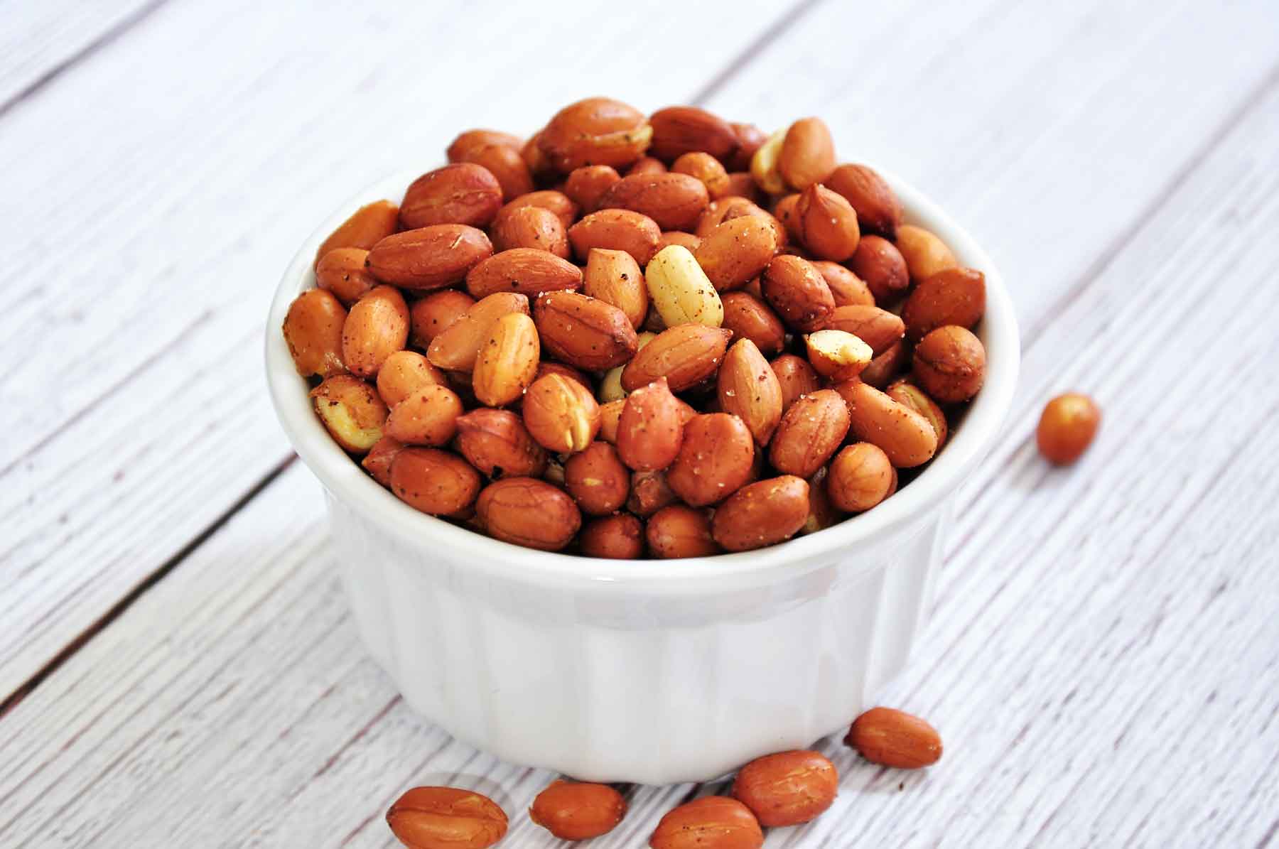 Roasted peanuts in a bowl.