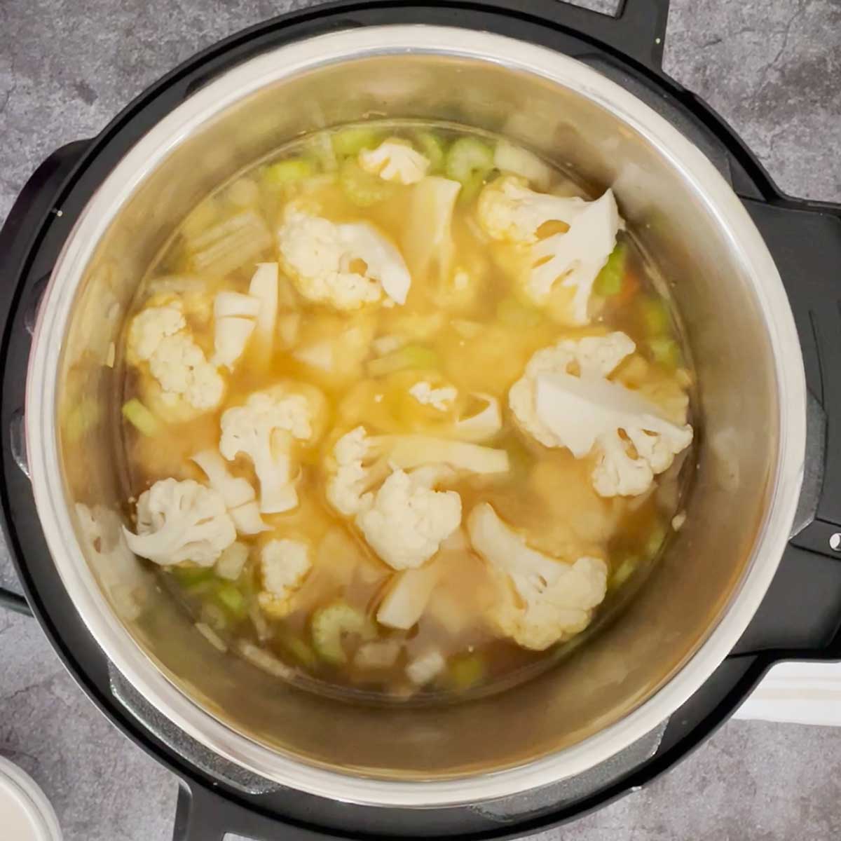 Cauliflower florets for soup in instant pot.