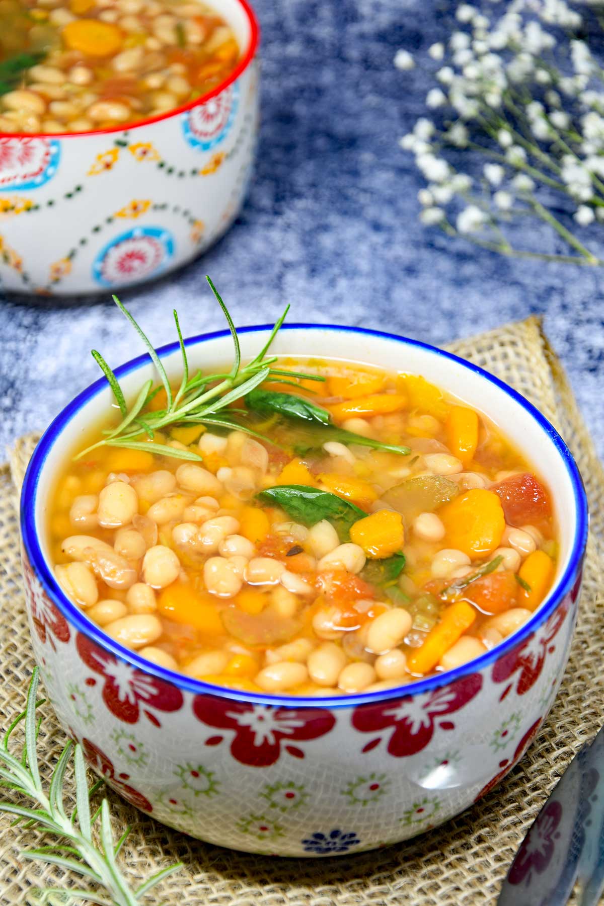 Navy Beans soup served in a soup bowl.