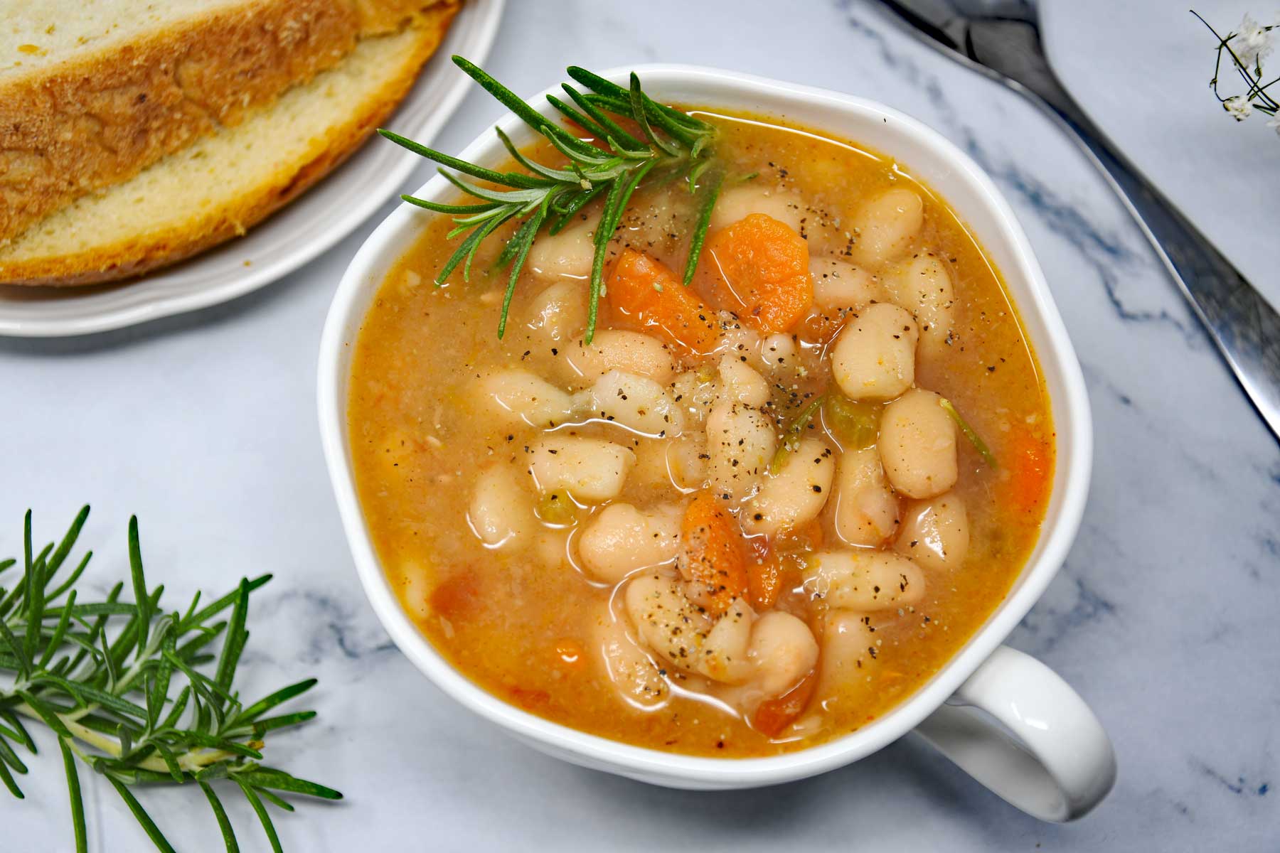 White beans soup in a bowl.