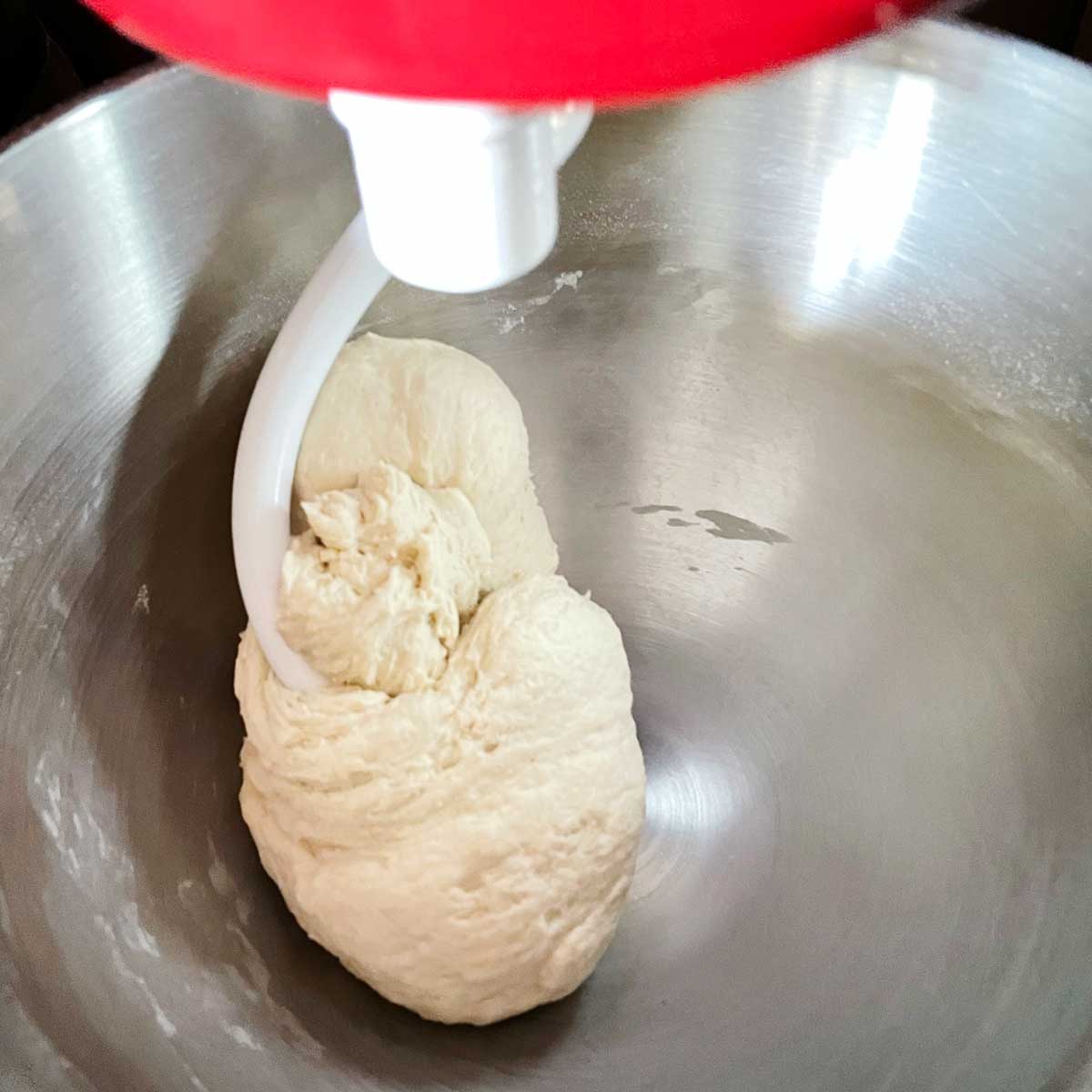 Air fryer naan dough in mixer bowl.
