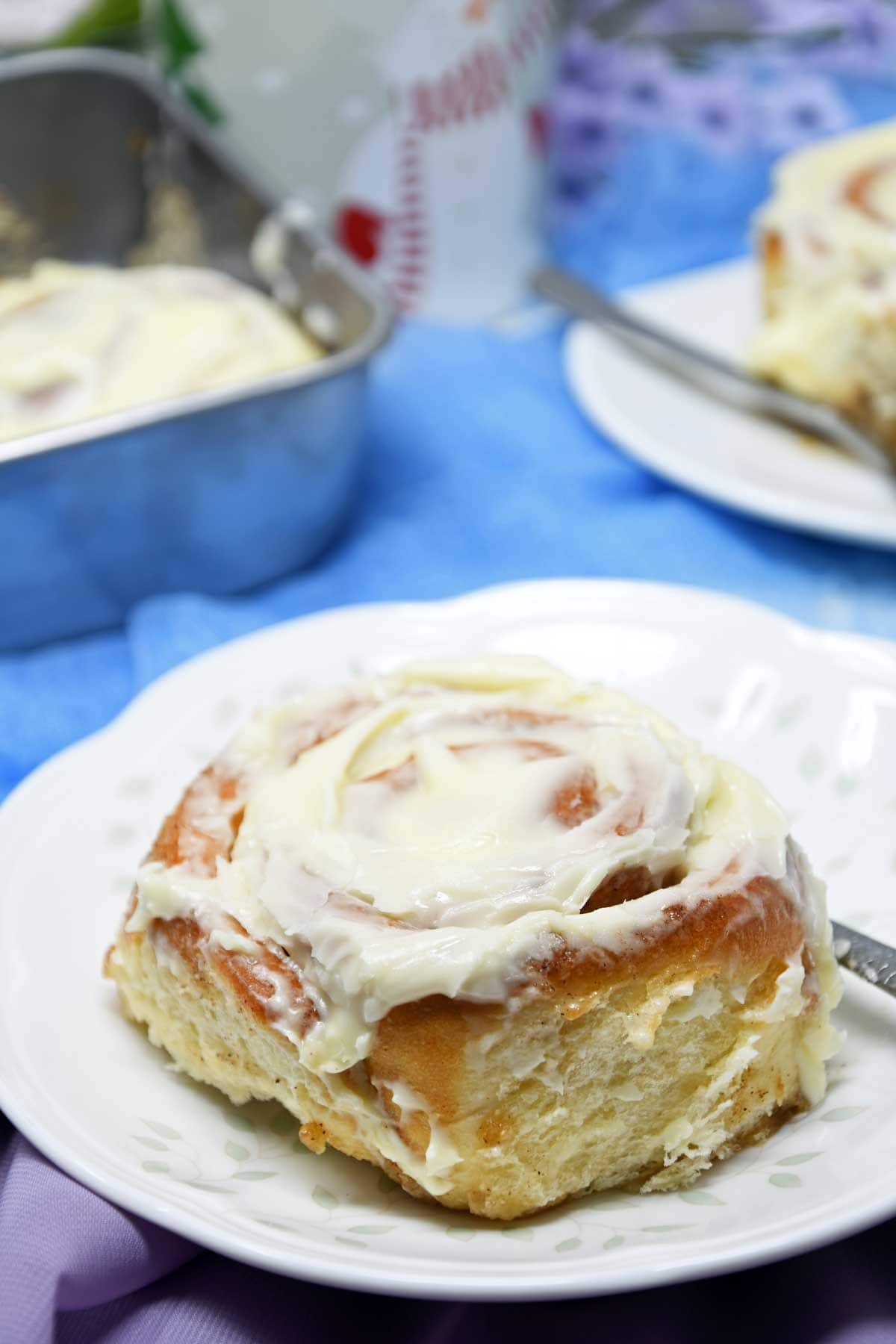 Cinnamon Roll served in a plate.