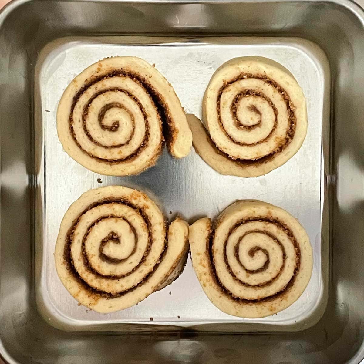 Cinnamon rolls in pan for rising.