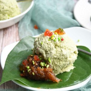 Betel leaves Ice cream scoop served on a plate.