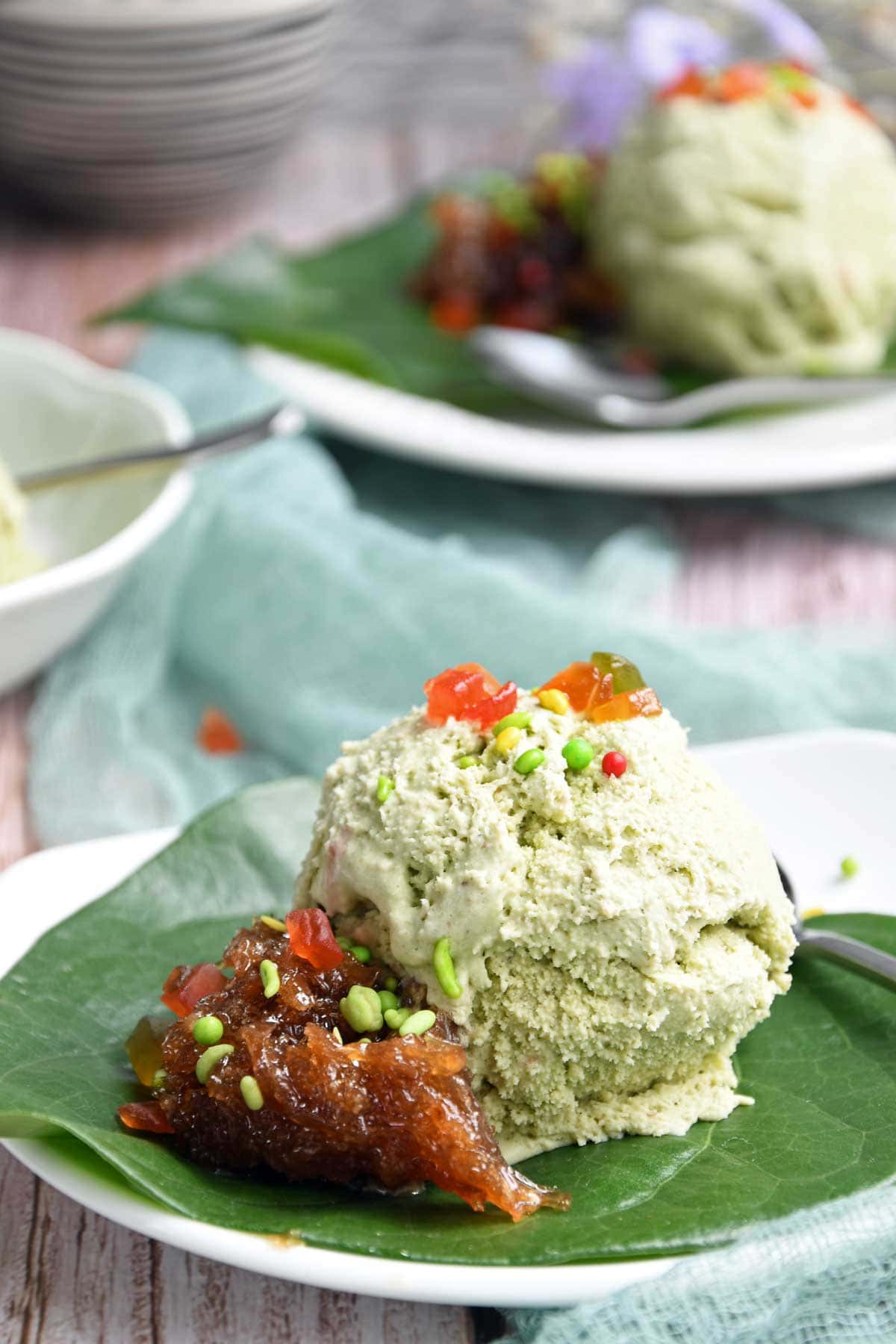 Betel leaves Ice cream scoop served on a plate.