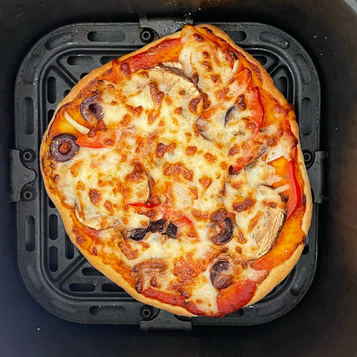 Air fryer baked pizza.