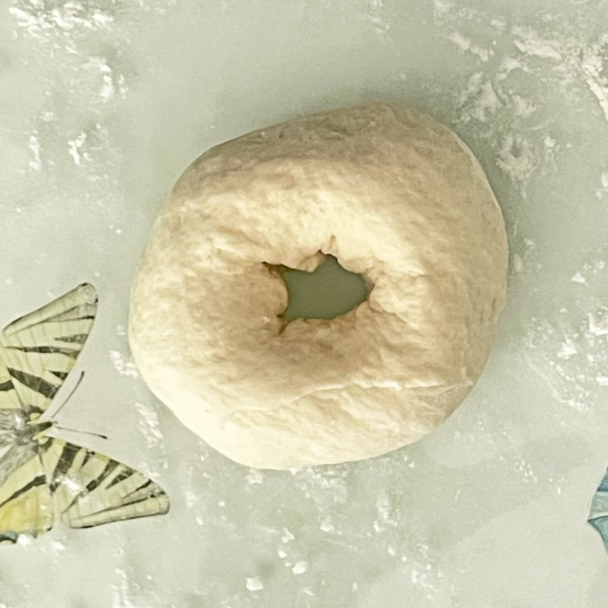 Bagels dough ball with a hole.