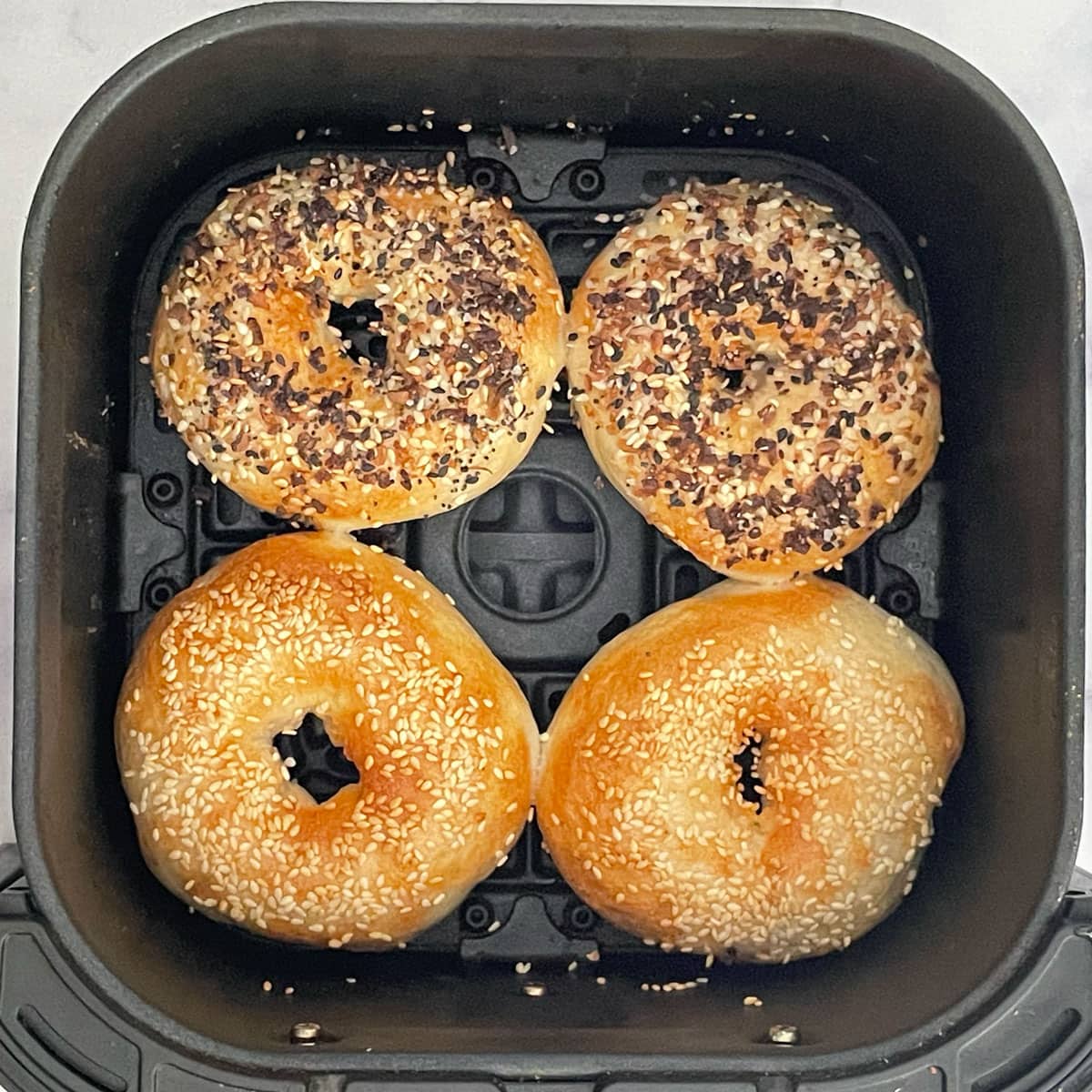 bagels in air fryer after cooking.