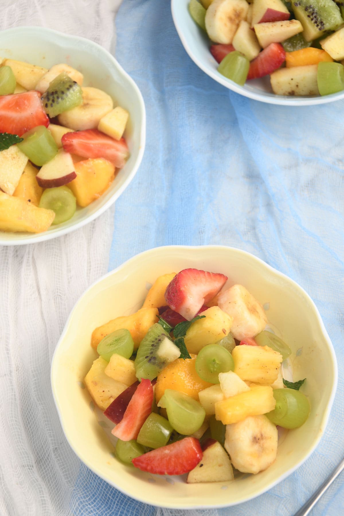 Fruit chaat served in a bowl.