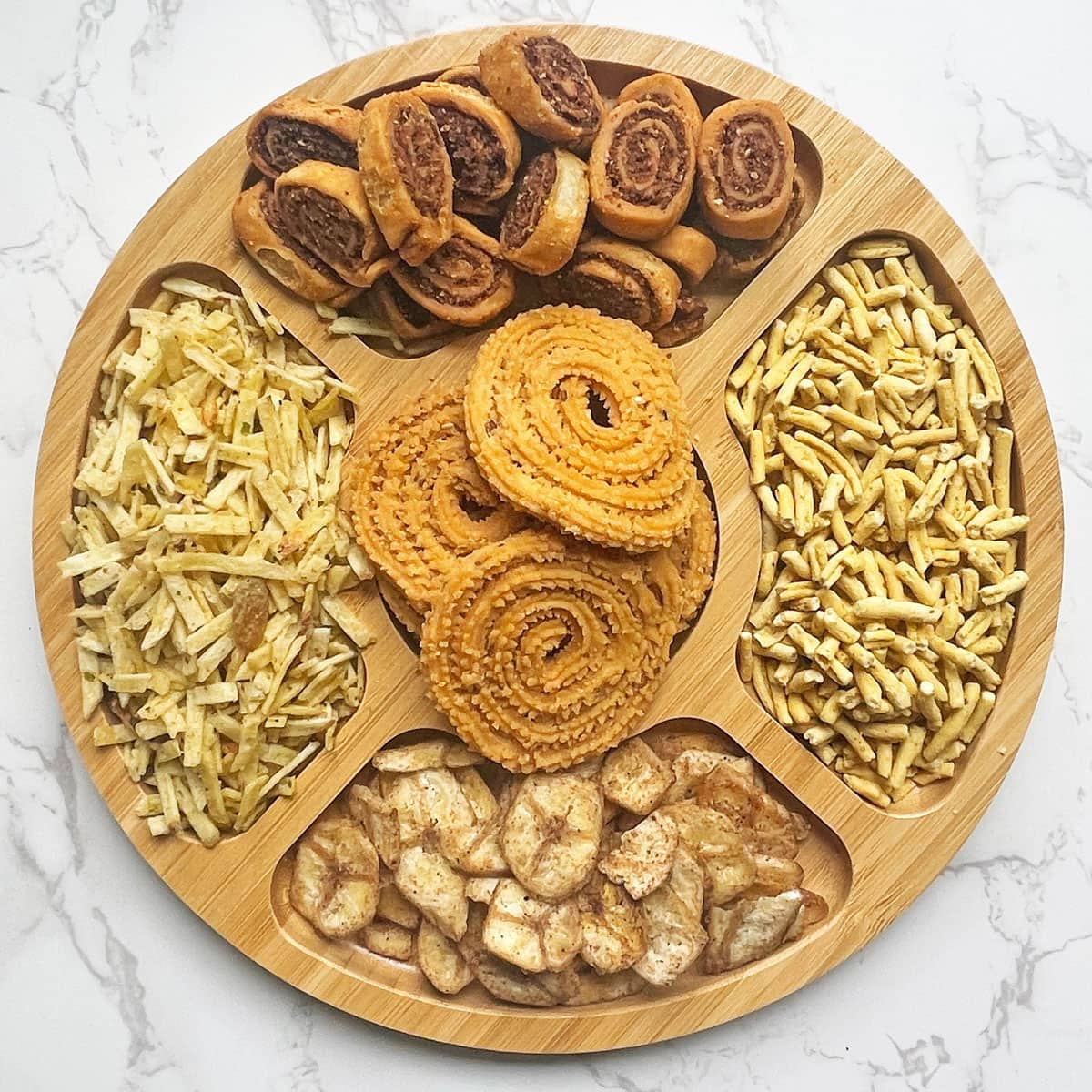Indian savory snacks in a platter.