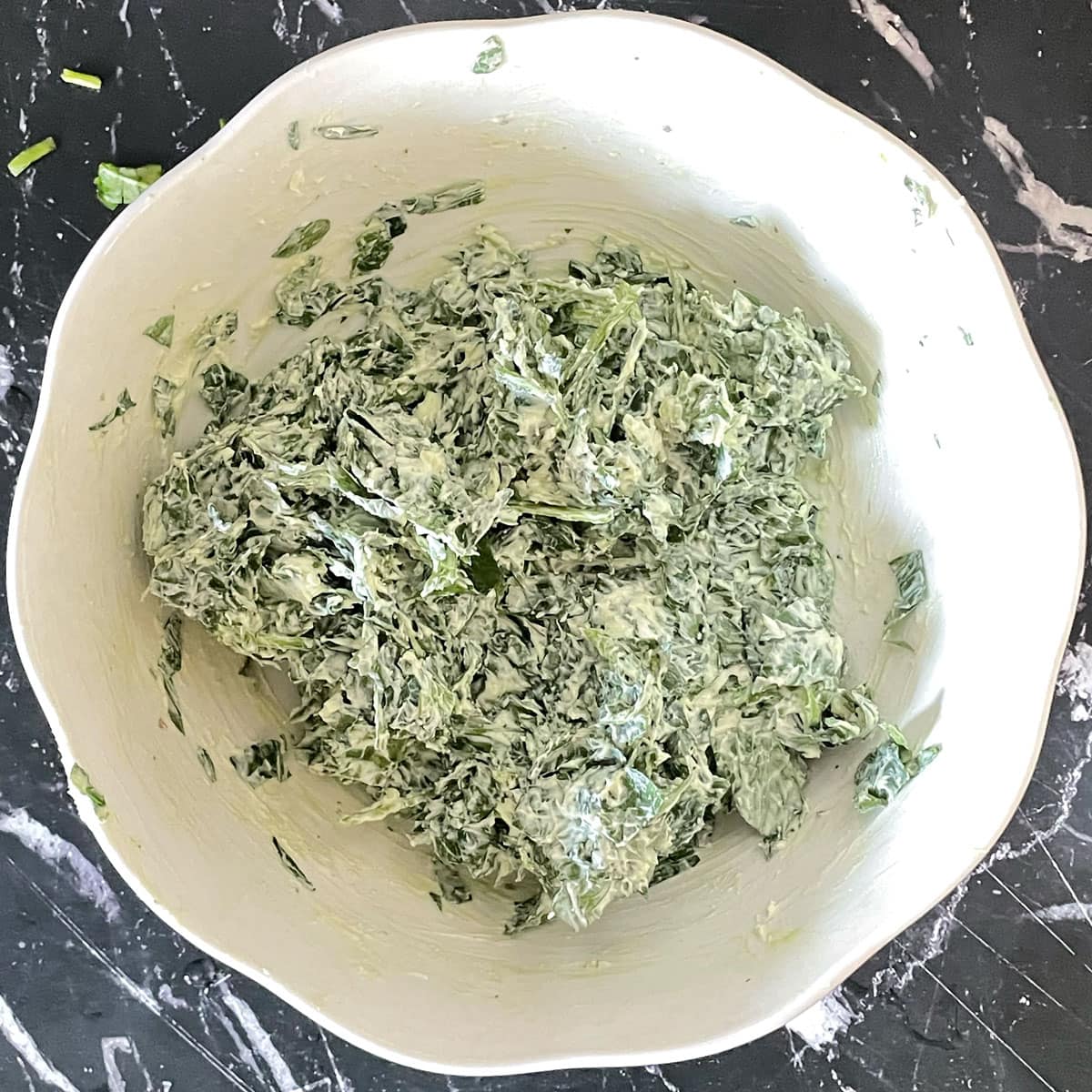 Spinach cream filling for pasta shells.