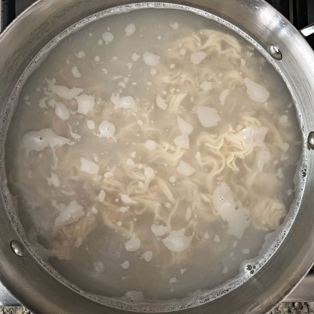 Noodles in boiling water.