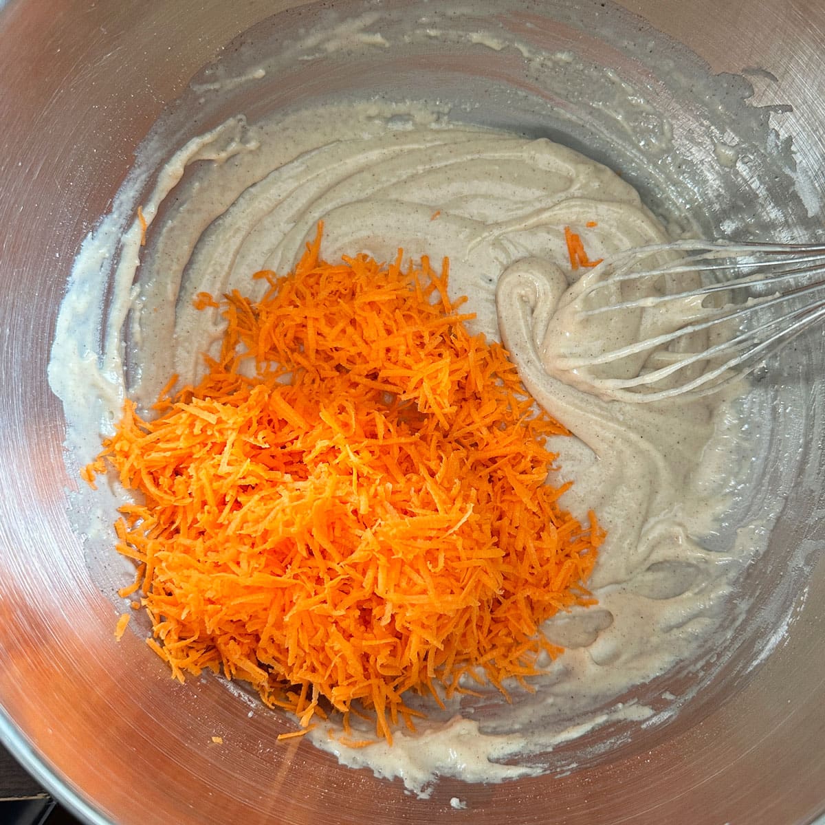 Carrot cupcake ingredients in mixing bowl.