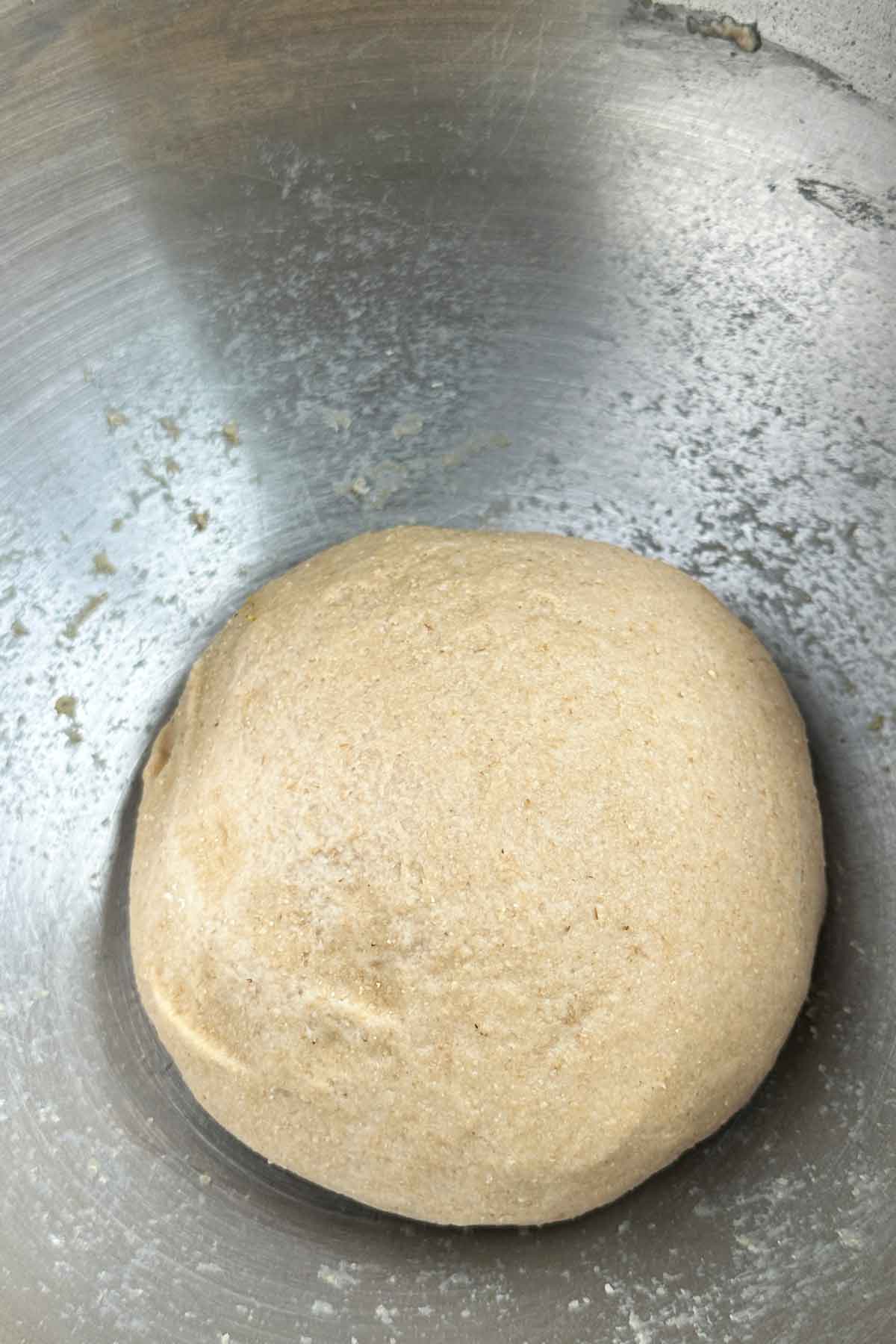 Roti dough in a bowl.