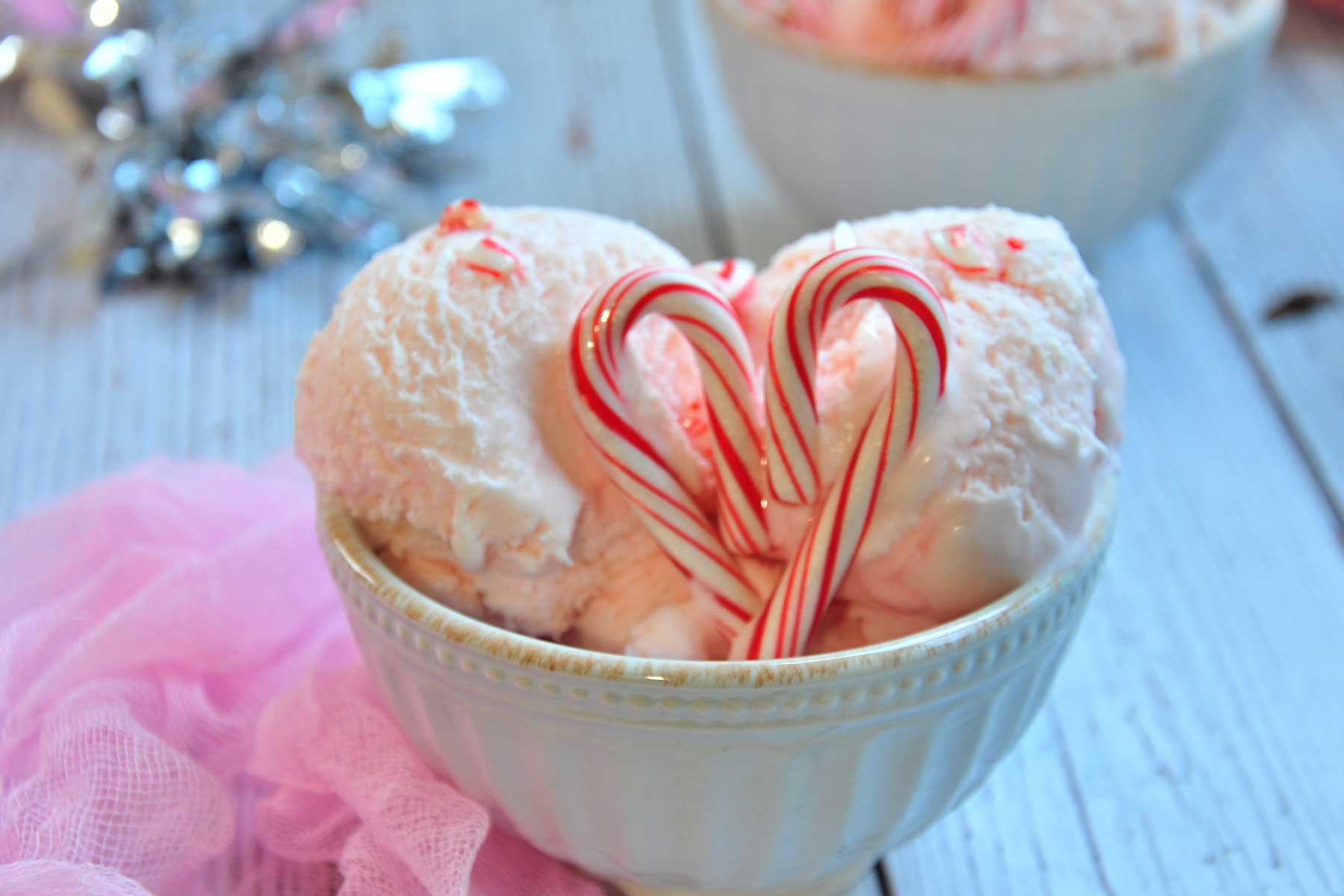 Peppermint ice cream scoops in a bowl.